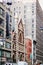 Buildings located along West 37th Street at Broadway, Manhattan, including the iconic Roman Catholic Church of the Holy Innocents