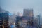 Buildings in Manhattan New York City Fading Away in the Fog at Winter During Nightime