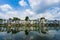 The buildings mirror into the lake