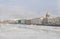Buildings on the Neva river embankment in St. Petersburg in the spring, ice on the river