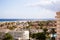 Buildings, palm trees, coastline and Atlantic ocean in Maspalomas, Gran Canaria