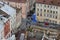 Buildings and people walking on the Rynok square, the centre of Lvov, top view