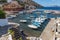 Buildings and Pier in Kamini beach in Hydra Island