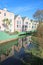 Buildings reflected in the River Dart at Totnes