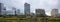 Buildings reflected in river waters