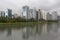 Buildings reflected in river waters