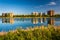 Buildings reflecting in Druid Lake, at Druid Hill Park in Baltimore, Maryland.