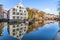 Buildings on riverside in Lier