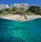 Buildings shore rock underwater with fish Spain