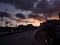 Buildings silhouette in cloudy sunset