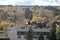 Buildings with a ski slope surrounded by trees in the background on a sunny autumn day in Vail