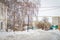 Buildings on the street in winter ,trees in the circle of houses