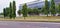 buildings and trees visible in the afternoon