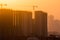 Buildings under construction at dusk