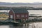 Buildings waterfront for boats, Norwegian seacoast