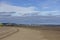 The built up area of the City of Dundee Port with Oil Rigs in for maintenance, and the small town of Tayport to the North.