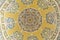 Bukhara, Uzbekistan - March 13, 2019: Traditional Islamic ornament elements painted inside of the dome