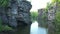 Buki village canyon, flying over the river and rocks.