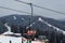 BUKOVEL, UKRAINE - FEBRUARY 28, 2018 Panoramic view of the ski slope, chairlift and mountains in Bukovel, Ukraine