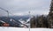 BUKOVEL, UKRAINE - FEBRUARY 28, 2018 Panoramic view of the ski slope, chairlift and mountains in Bukovel, Ukraine