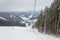 BUKOVEL, UKRAINE - FEBRUARY 28, 2018 Panoramic view of the ski slope, chairlift and mountains in Bukovel, Ukraine