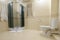 Bukovel, Ukraine February 4, 2022: bathroom with hydro box, light style interior of the bathroom.