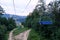 Bukovel, Ukraine - July 2020: Charlift moving upward in the Carpathian mountains during summertime. Summer holidays in Ukraine.