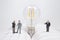 a bulb on open book. Idea or creativity concep with figure