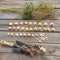 Bulbs Allium aflatunense on a wooden background