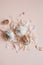 Bulbs of garlic on pink background, close-up. Organic garlic top view. Natural antiviral agent.