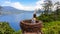 Buleleng - A girl sitting in a birds nest with lake view