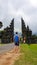 Buleleng - A man standing in front of Bali Handara Gate