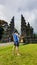 Buleleng - A man standing in front of Bali Handara Gate