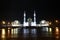 BULGAR, TATARSTAN, RUSSIA, NOVEMBER 18, 2019: New White Mosque on a rainy night, in the illumination of lanterns and reflection in