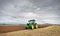 Bulgaria - August 22th,2015:Ploughing a field with John Deere