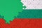 Bulgaria flag is depicted on a completed jigsaw puzzle with free green copy space on the left side