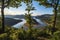 Bulgaria, Kardzhali dam, panoramic view of meander in Arda river, surrounded with green forest, summer time during sunset.