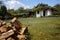 Bulgarian cottage with logs chopped and prepared for winter