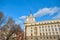 Bulgarian flags on government buildings in sofia during sunny day.