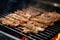 bulgogi beef strips sizzling on hot bbq grill