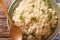 Bulgur with parsley macro on a plate on the table. horizontal to