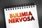 Bulimia nervosa - eating disorder characterized by binge eating followed by purging and excessive concern, text concept on notepad