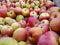 Bulk Apples in Bin. Ripe sweet red apples. Fresh organic apples from side for sale. Close-up. Full frame