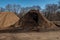Bulk Brown Mulch Pile Ready for Spring