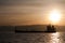 Bulk-carrier ship at sunset