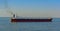 Bulk carrier vessel in high sea.