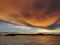 The bulk ship in anchorage, sunset