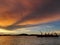 The bulk ship in anchorage, sunset