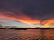 The bulk ship in anchorage, sunset