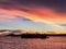 The bulk ship in anchorage, sunset, silhouette